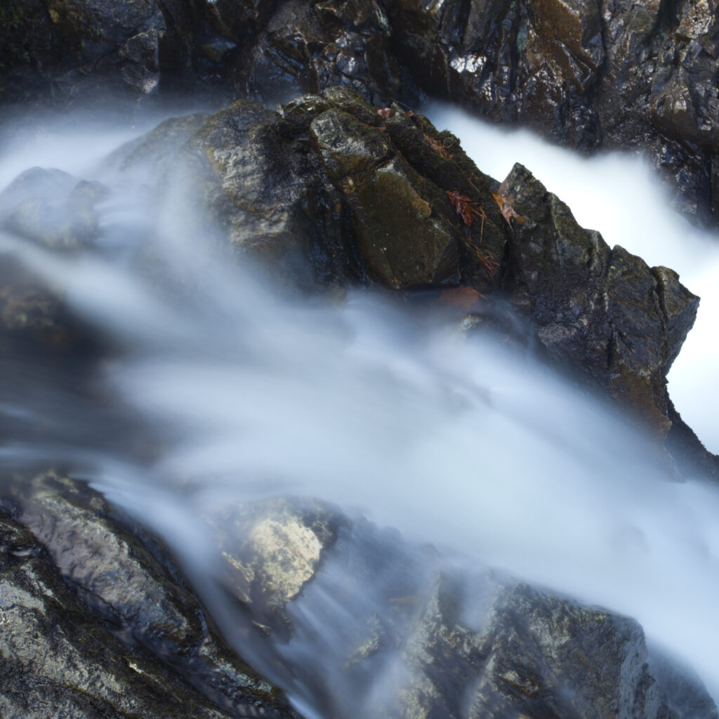 England, Cumbria, Lake District National Park. Stream running into the Thirlmere Reservoir