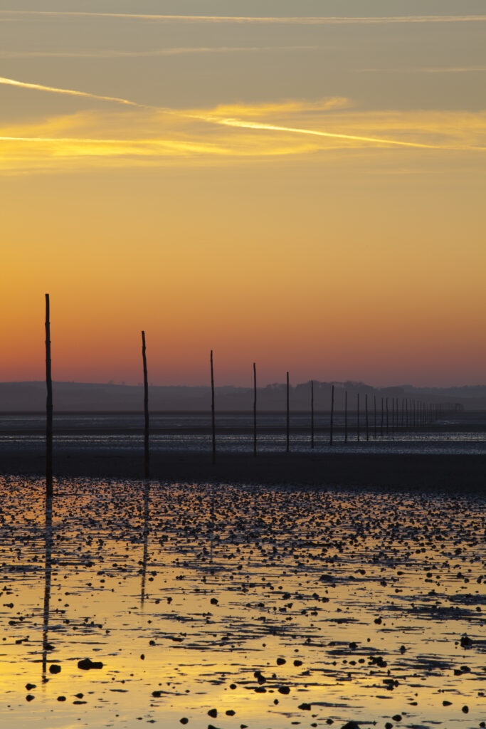 England, Northumberland, Northumberland Heritage Coast. The Pilgrim's Causeway linking the Holy Island of Lindisfarne off the Northumberland Coast with the mainland.