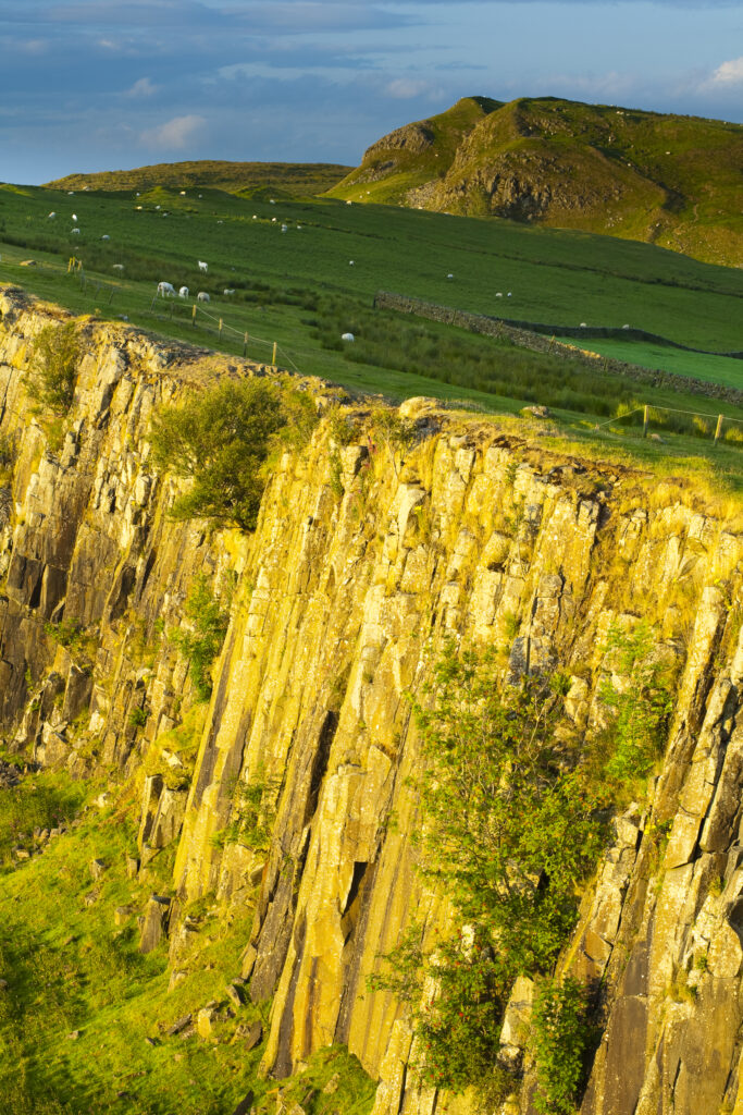 England, Northumberland, Hadrian's Wall. Walltown Crags and the route of Hadrians Wall along the Great Whin Sill.