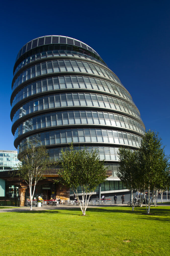 England, London, Southwark. City Hall is the headquarters of the Greater London Authority (GLA) which comprises the Mayor of London and London Assembly. and is located near Tower Bridge on the River Thames.