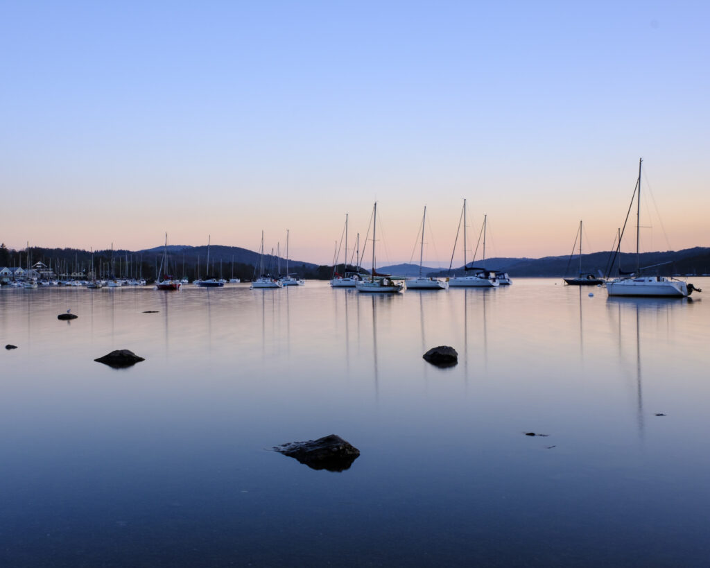 England, Cumbria, Lake District National Park. Parson Wyke on Lake Windermere viewed at dusk.