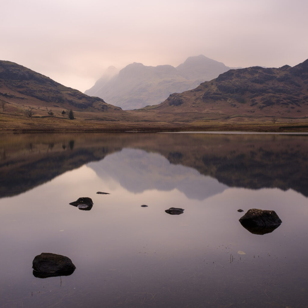 England, Cumbria, Lake District National Park. Blea Tarn viewed at dusk.