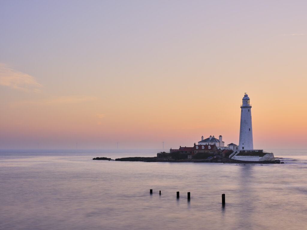 England, Tyne and Wear, Whitley Bay. St Mary's Lighthouse and Island photographed at dawn.