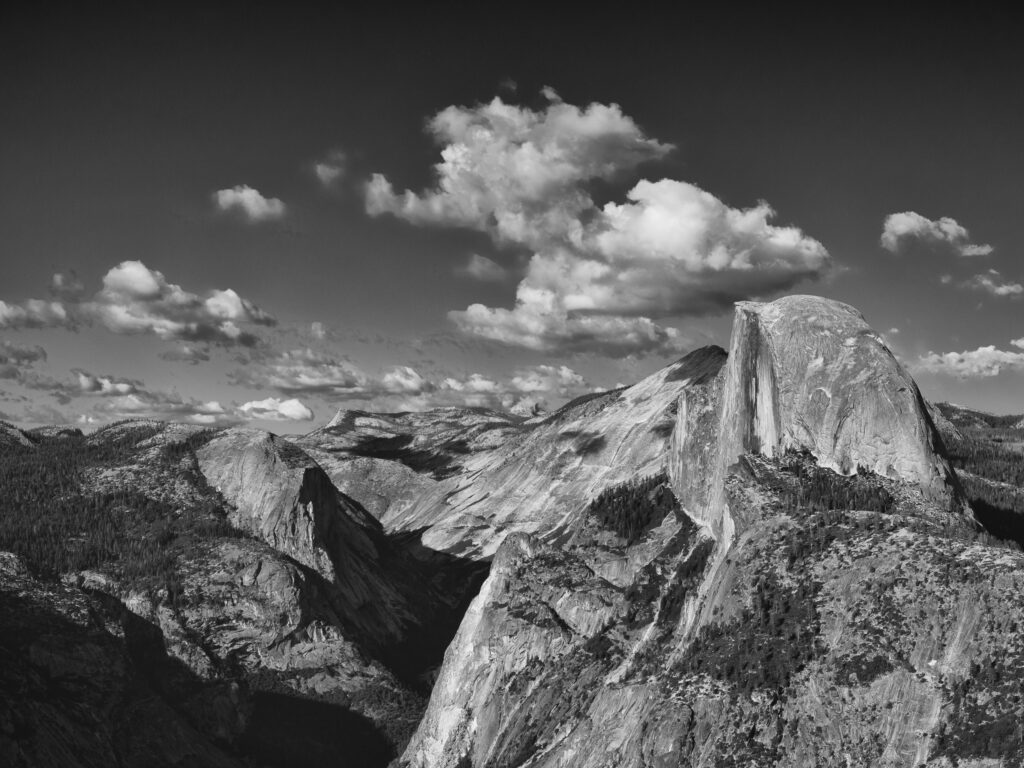 United States of America, California, Yoesmite National Park. The iconic view of Half Dome viewed from Glacier Point at sunset.