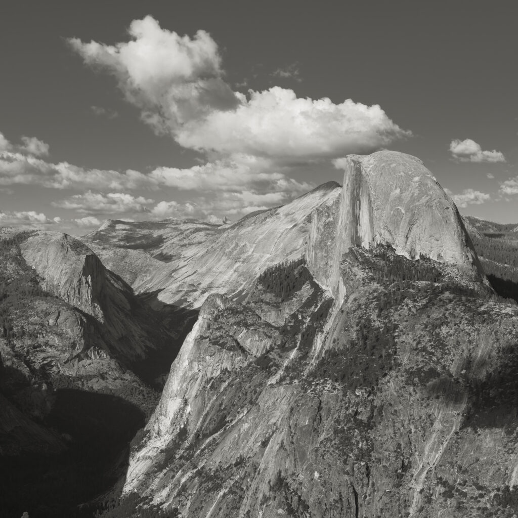 United States of America, California, Yoesmite National Park. The iconic view of Half Dome viewed from Glacier Point at sunset.