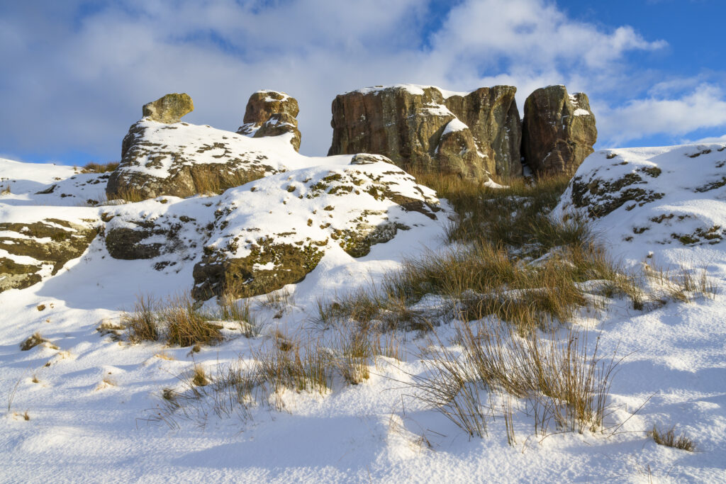 England, Northumberland, Caller Crag & Boulders. Late afternoon light illuminates the snow covered features of Caller Crag & Boulders.