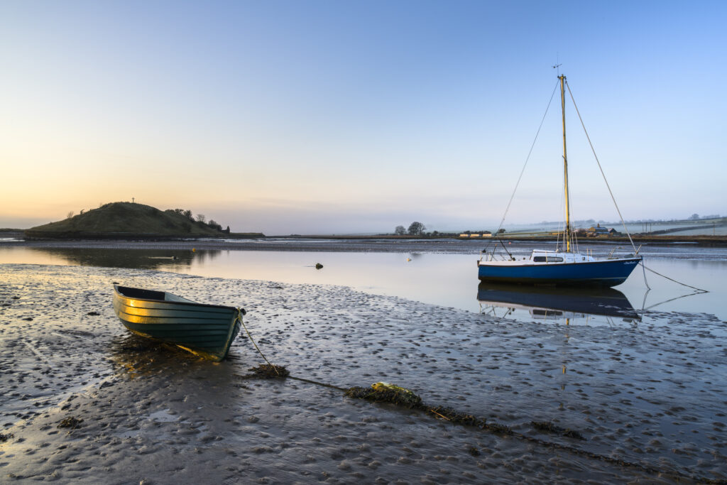 England, Northumberland, Alnmouth. The Aln estuary near Alnmouth at low tide on a misty morning.