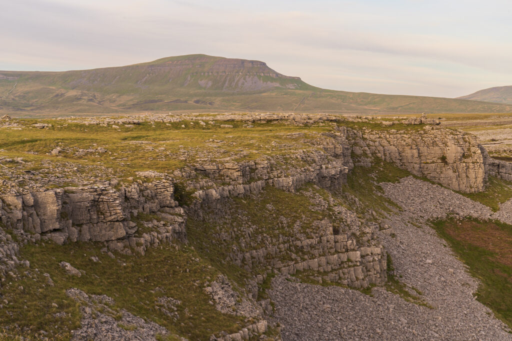 England, North Yorkshire, Yorkshire Dales National Park. Moughton Scars, looking towards the peak of Pen-y-ghent.