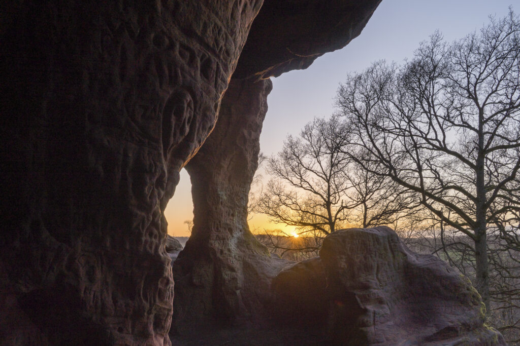 England, West Midlands, Kinver Edge. Carved graffiti in the sandstone walls of the caves in Nannys Rock.