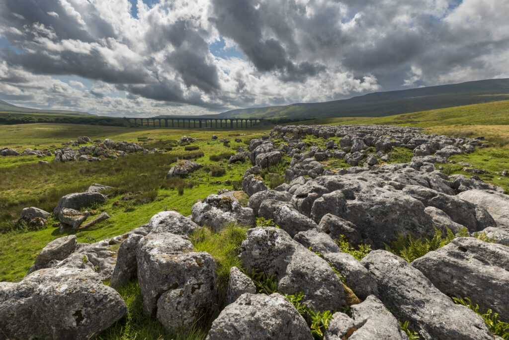 England, North Yorkshire, Yorkshire Dales National Park. Ribblehead Viaduct, a railway viaduct crossing the valley of the River Ribble at Ribblehead.