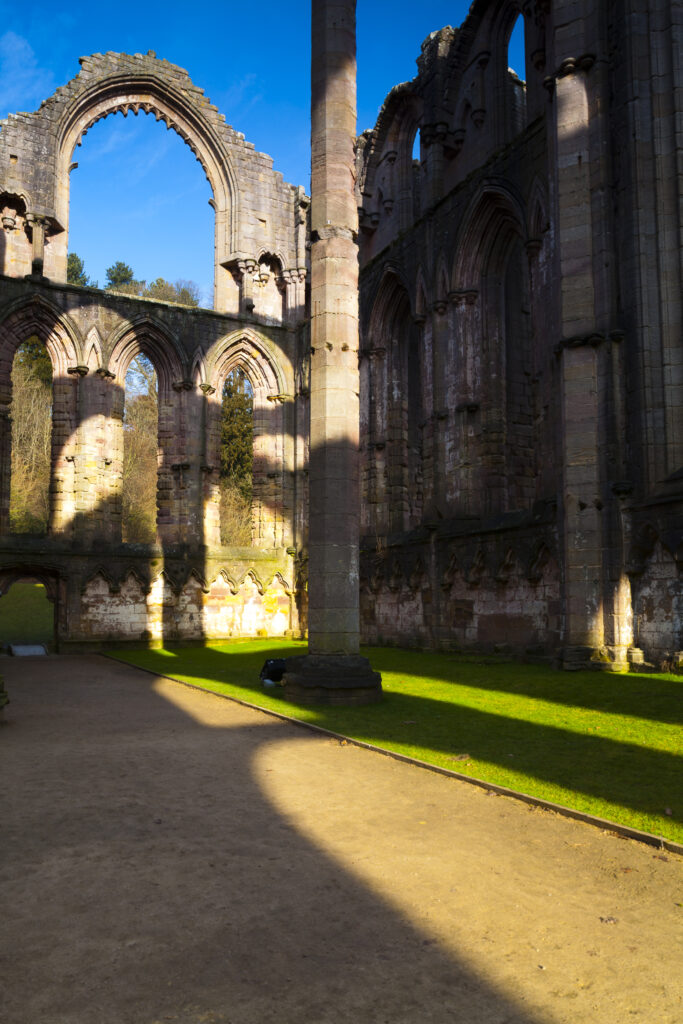 England, North Yorkshire, Fountains Abbey and Studley Royal World Heritage Site. Archetecture of Fountains Abbey, part of the Fountains Abbey and Studley Royal World Heritage Site located near Ripon.