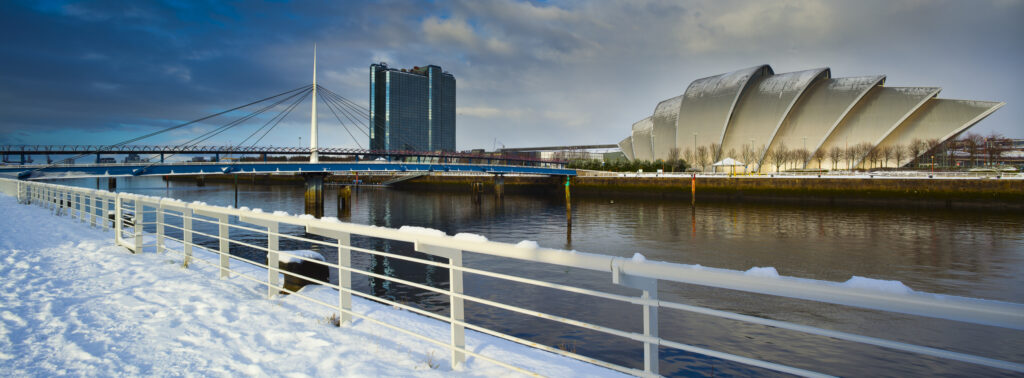 Scotland, Glasgow, Pacific Quay. Panoramic view of the Scottish Exhibition and Conference Centre located on the Pacific Quay near Bells Bridge on the River Clyde. The building is referred to locally as the Armadillo.