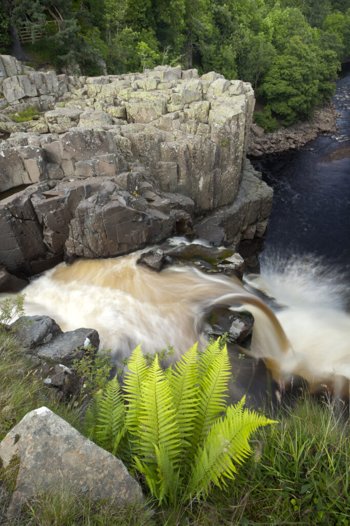 England, County Durham, High Force. The River Tees cascades down the High Force waterfall in County Durham.