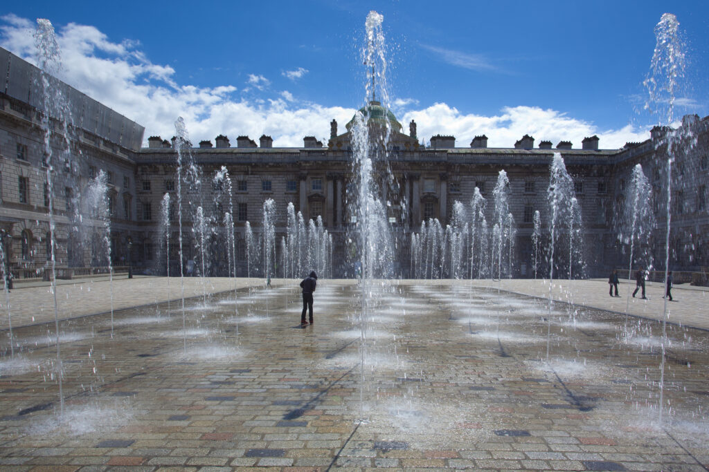 England, City of London, Somerset House. Dancing fountains in the central courtyard of Somerset House in London.