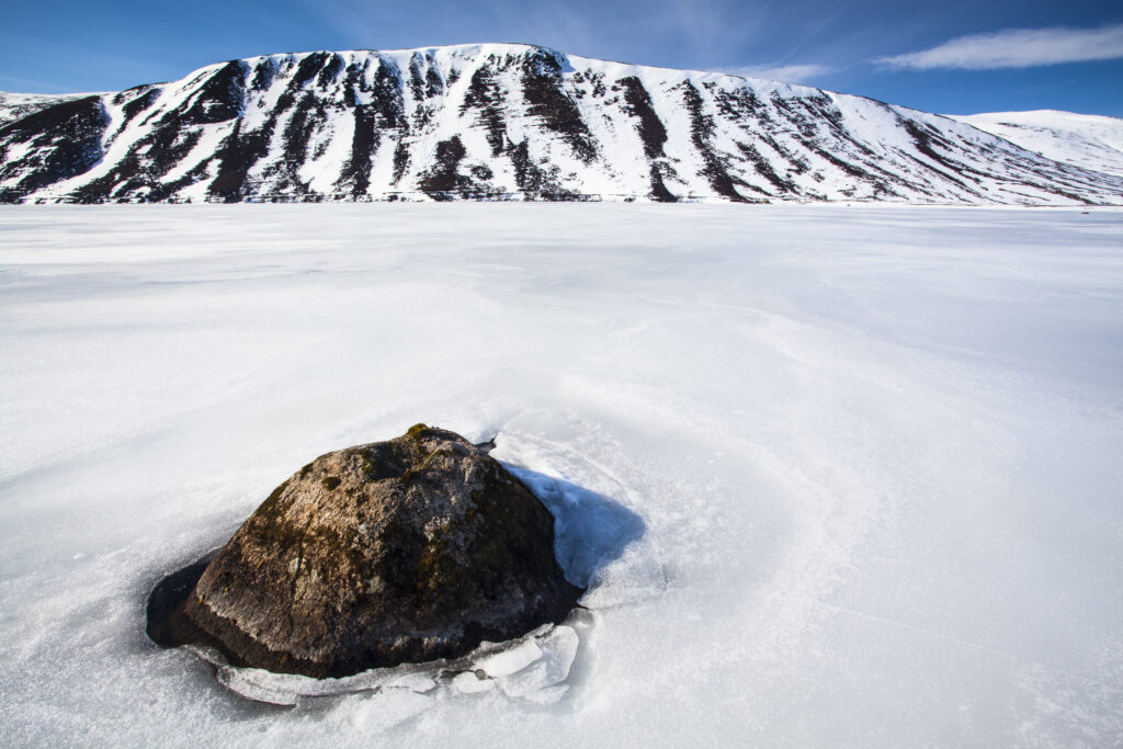 Scotland, Scottish Highlands, Cairngorms National Park. The frozen expanse of Loch Muich, located on the royal estate of Balmoral.