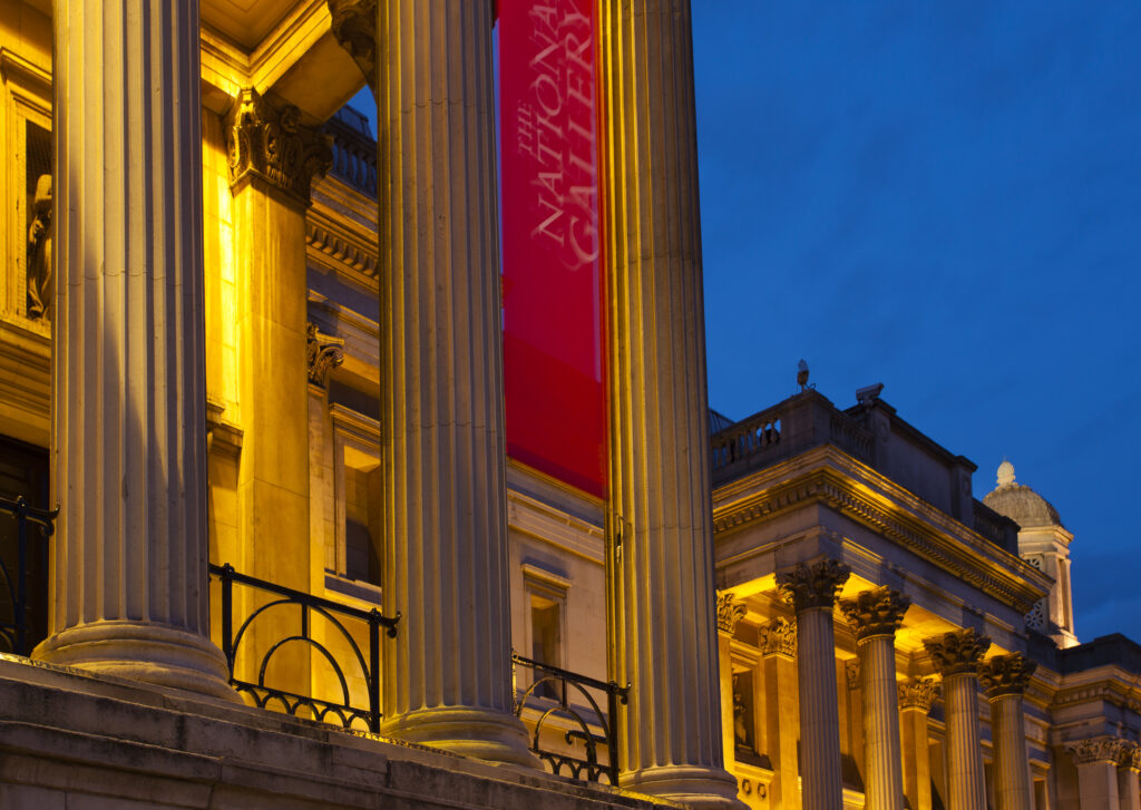 England, Greater London, City of Westminster. The National Gallery located in Trafalgar Square, a popular tourist destination in London, photographed at dusk.