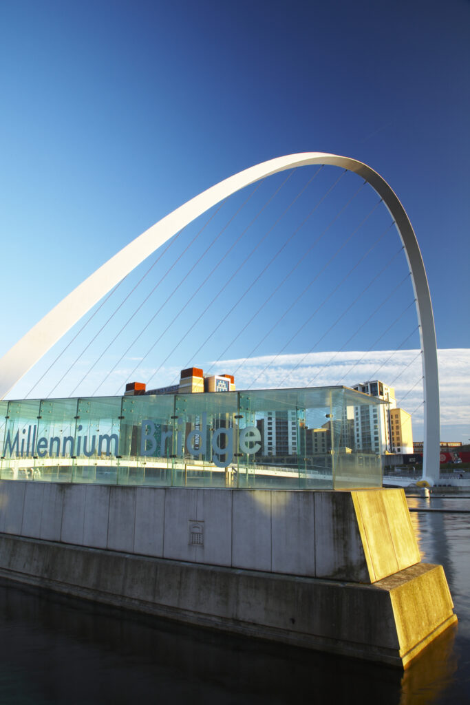 England, Tyne & Wear, Newcastle Upon Tyne. The Millennium Bridge and the river Tyne, viewed from the Newcastle upon tyne quayside