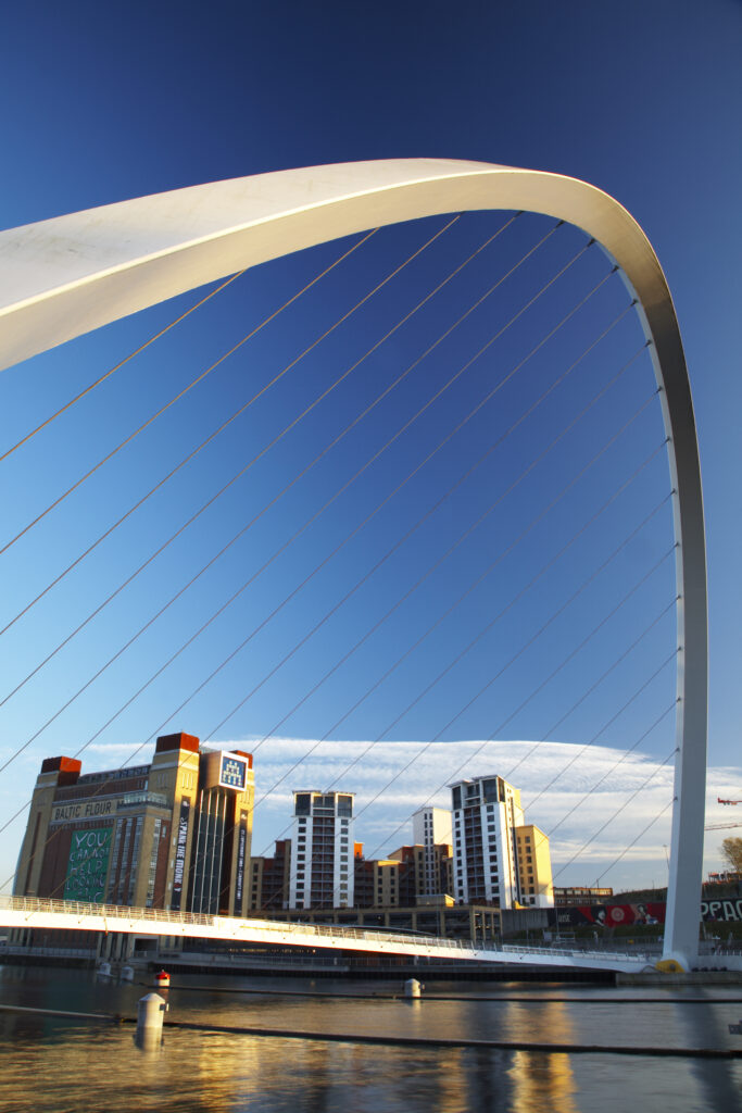 England, Tyne & Wear, Newcastle Upon Tyne. The Millennium Bridge and the river Tyne, viewed from the Newcastle upon tyne quayside