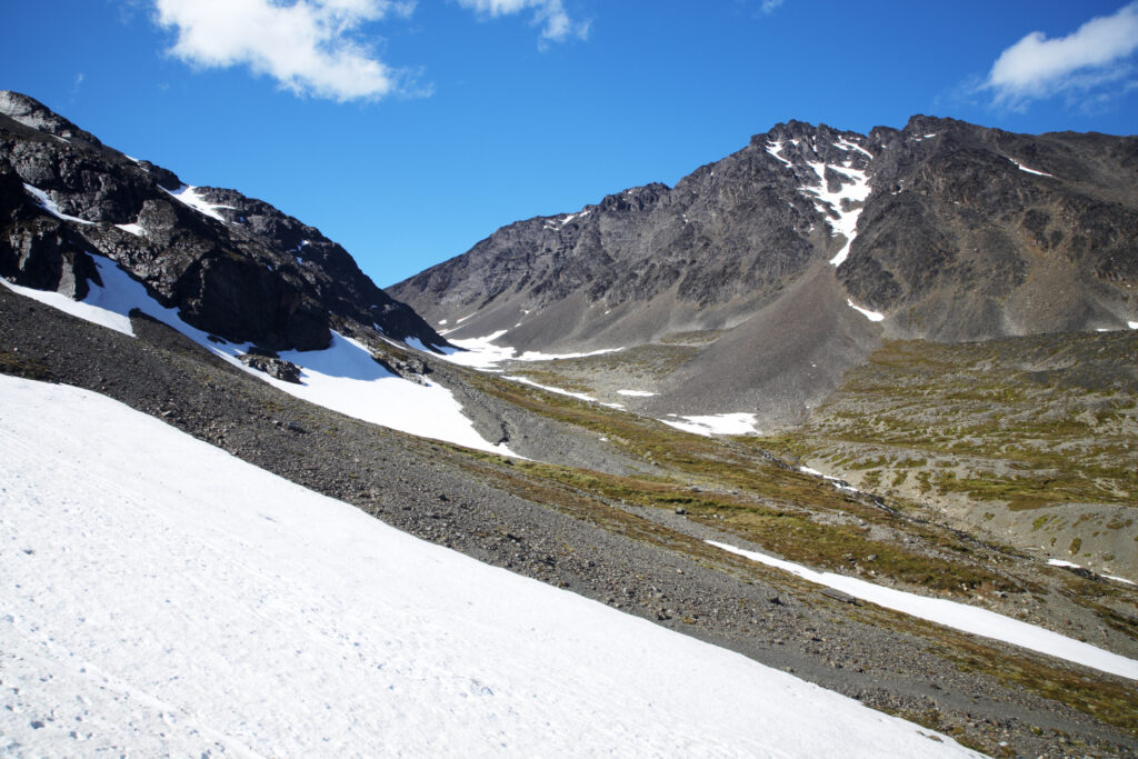 Argentina, Tierra Del Fuego, Ushuaia. The peaks and snow in a mountain valley near Ushuaia.