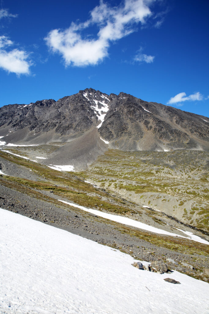 Argentina, Tierra Del Fuego, Ushuaia. The peaks and snow in a mountain valley near Ushuaia.