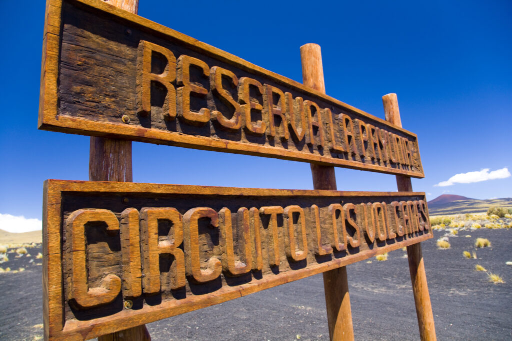 RF - Argentina, Mendoza, Parque Provincial Payunia. Sign marking the start of the circuit road through the reserve.