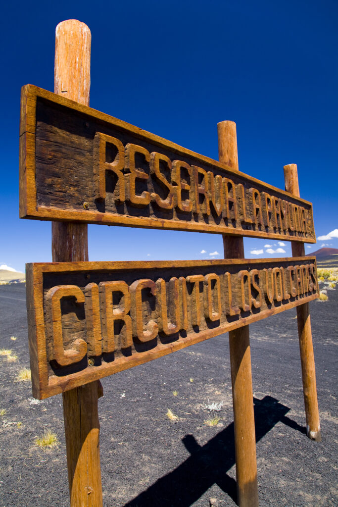 RF - Argentina, Mendoza, Parque Provincial Payunia. Sign marking the start of the circuit road through the reserve.