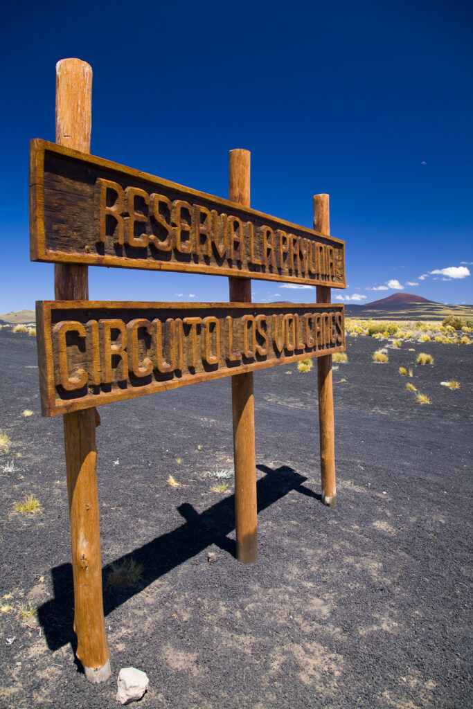 Argentina, Mendoza, Parque Provincial Payunia. Sign marking the start of the circuit road through the reserve.