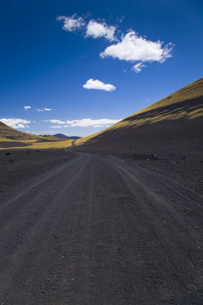 Argentina, Mendoza, Parque Provincial Payunia.Basic road used by 4 wheel drive vehicles to explore the reserve.