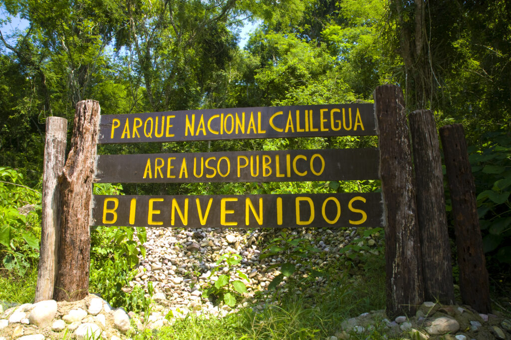 Argentina, Salta, Parque Nacional Calilegua. Welcoming sign near a public picnic area in the National Park.