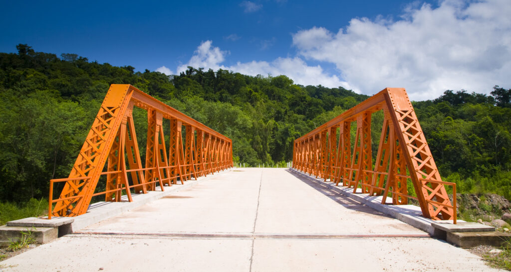 Argentina, Salta, Parque Nacional Calilegua. Road running over a bridge in the National Park.