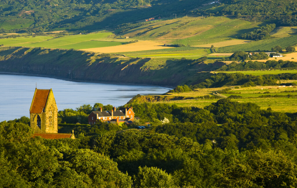 England, North Yorkshire, North York Moors National Park. The scenic Robin Hood's Bay, a popular tourist destination and the end point of the 'Coast to Coast' walk.