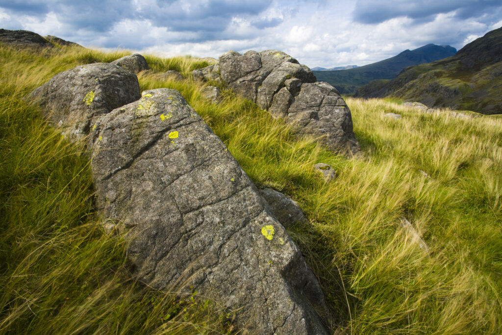 England, Cumbria, Lake District National Park. The wild, rocky outcrop of Peathill Crag near Hardknott Pass in the Western Lake District.