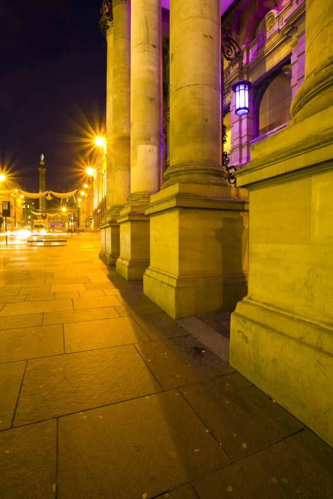 England, Tyne and Wear, Newcastle Upon Tyne. The Grade I listed Theatre Royal photographed at night. Opened in February 1837, the Theatre Royal dominates the heart of Newcastle’s Grainger Town.
