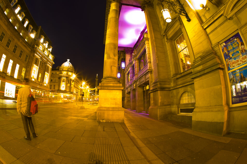 England, Tyne and Wear, Newcastle Upon Tyne. The Grade I listed Theatre Royal photographed at night. Opened in February 1837, the Theatre Royal dominates the heart of Newcastle’s Grainger Town.