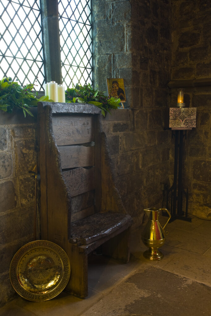 England, Tyne and Wear, St Pauls Monastery and church. Bedes chair, an ancient oak seat between 800 to 1100 years presumed to have belonged to the venerable Bede.