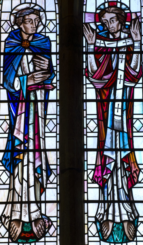 England, Tyne and Wear, St Pauls Monastery and church. East wall stained glass window in the Chancel depicting St Paul and the Risen Christ.