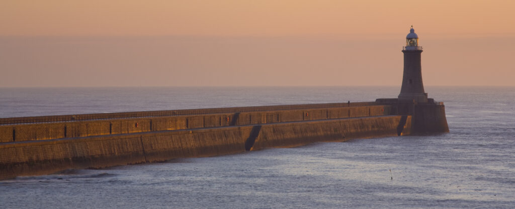 England, Tyne & Wear, Tynemouth. The North Pier at the mouth of the River Tyne.