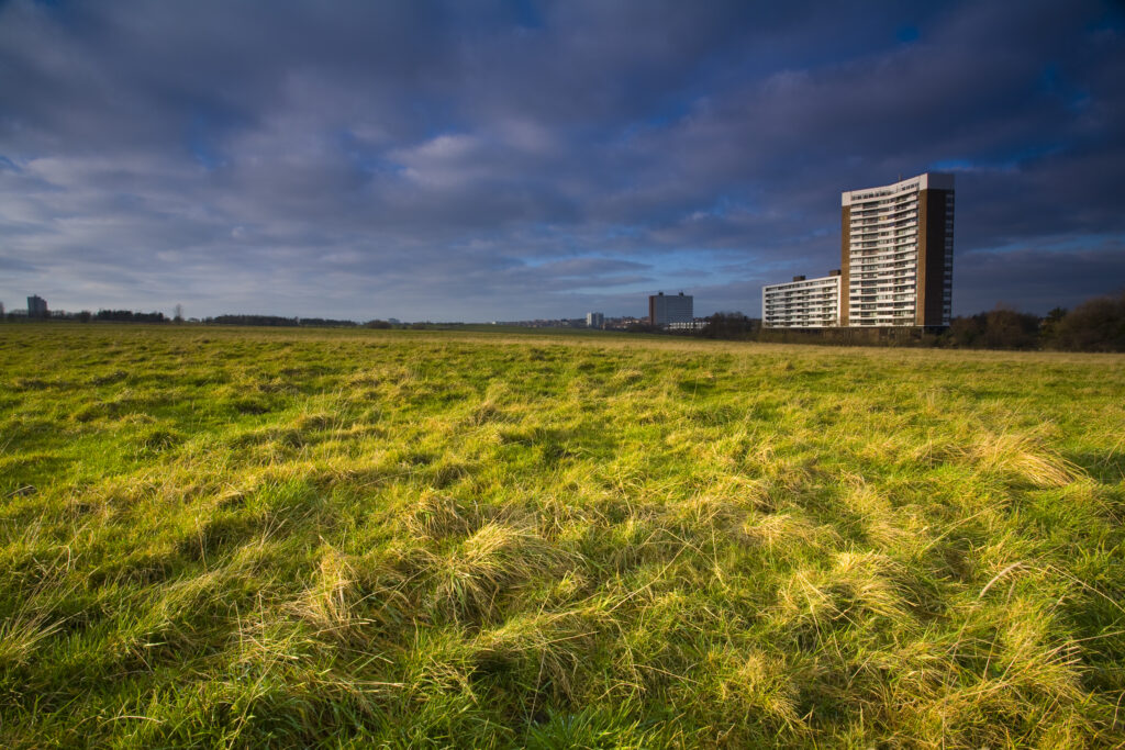 England, Tyne & Wear, Newcastle Upon Tyne. Nuns Moor with high rise flats of Kenton in the distance.