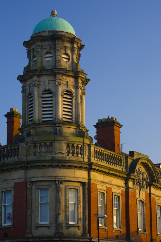 England, Tyne and Wear, Wallsend. Late afterrnoon sun highlights the features of the Wallsend Town Hall built in 1907.