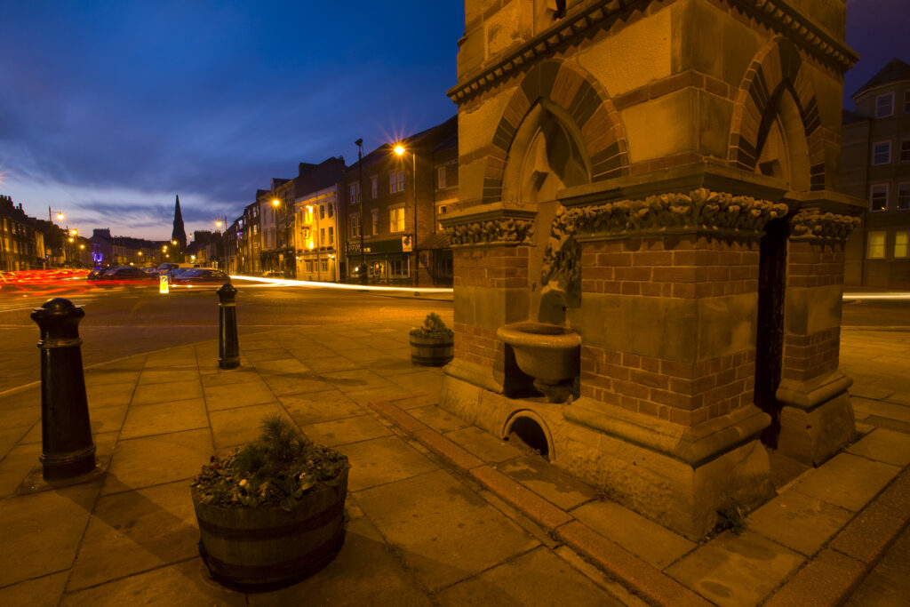 England, Tyne and Wear, Tynemouth. Tynemouth Front street at dusk.