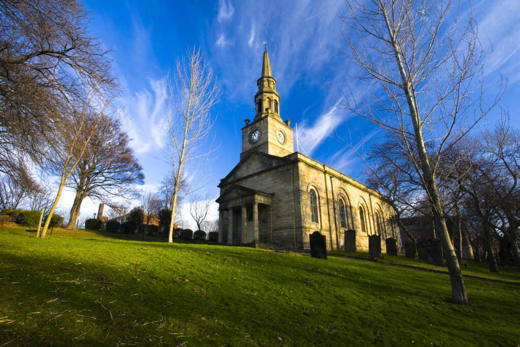 England, Tyne and Wear, Newcastle Upon Tyne. St Anns Church was originally set in fields overlooking the East Quayside. The church became famous for the distribution of hot soup to the unemployed during the winters of 1908 - 1910 by the vicar, Bernard East.