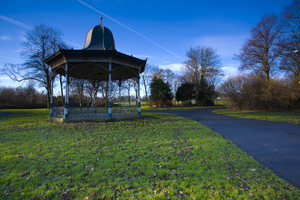 England, Tyne and Wear, Newcastle Upon Tyne. Bandstand in Exhibition Park, one of the numerous green spaces to be found near the city center. The bandstand is the only remaining item from the 1887 Royal Jubilee Exhibition from which the park gained its name.