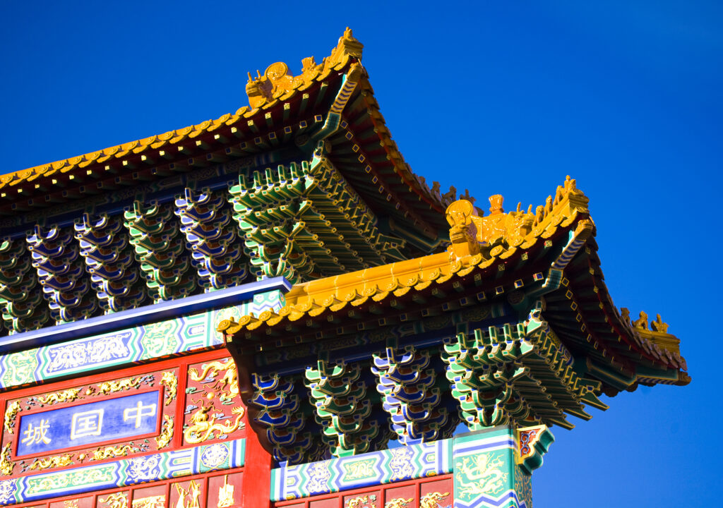 England, Tyne and Wear, Newcastle Upon Tyne. Detail of Chinese artwork and design on the Chinese Arch heralding the entry into the China Town area of Newcastle.