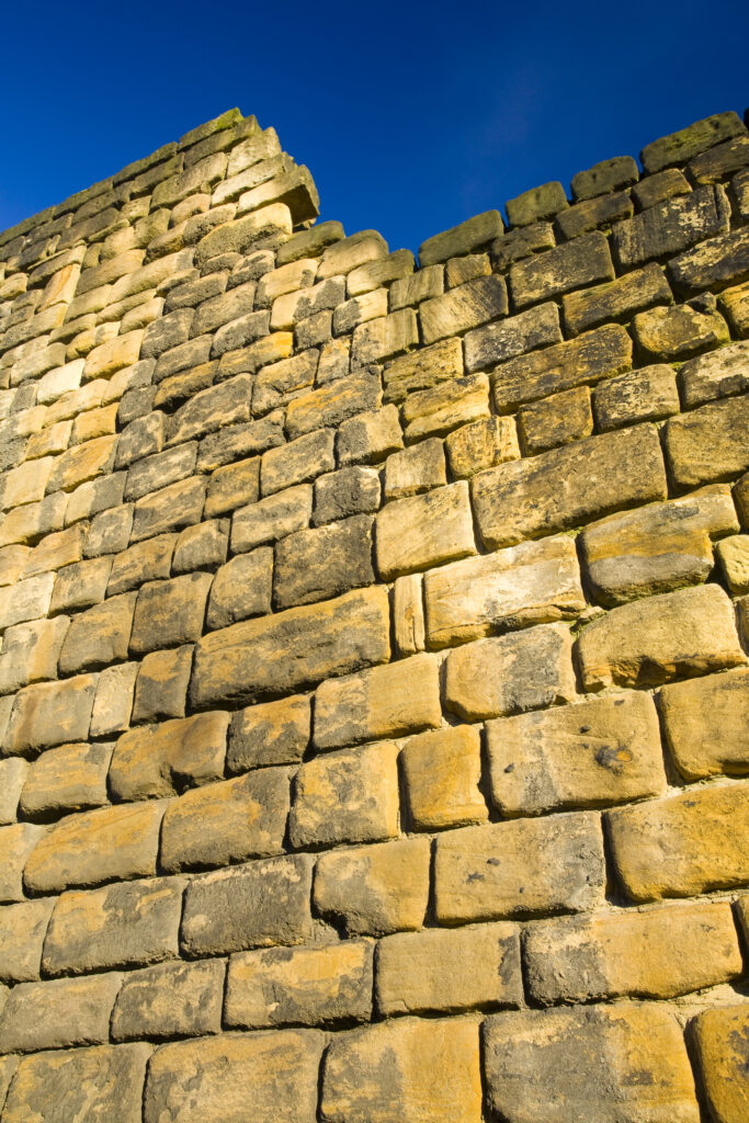 England, Tyne and Wear, Newcastle Upon Tyne. The city wall of Newcastle Upon Tyne, deviding an ecletric mix of historic and modern architecture.