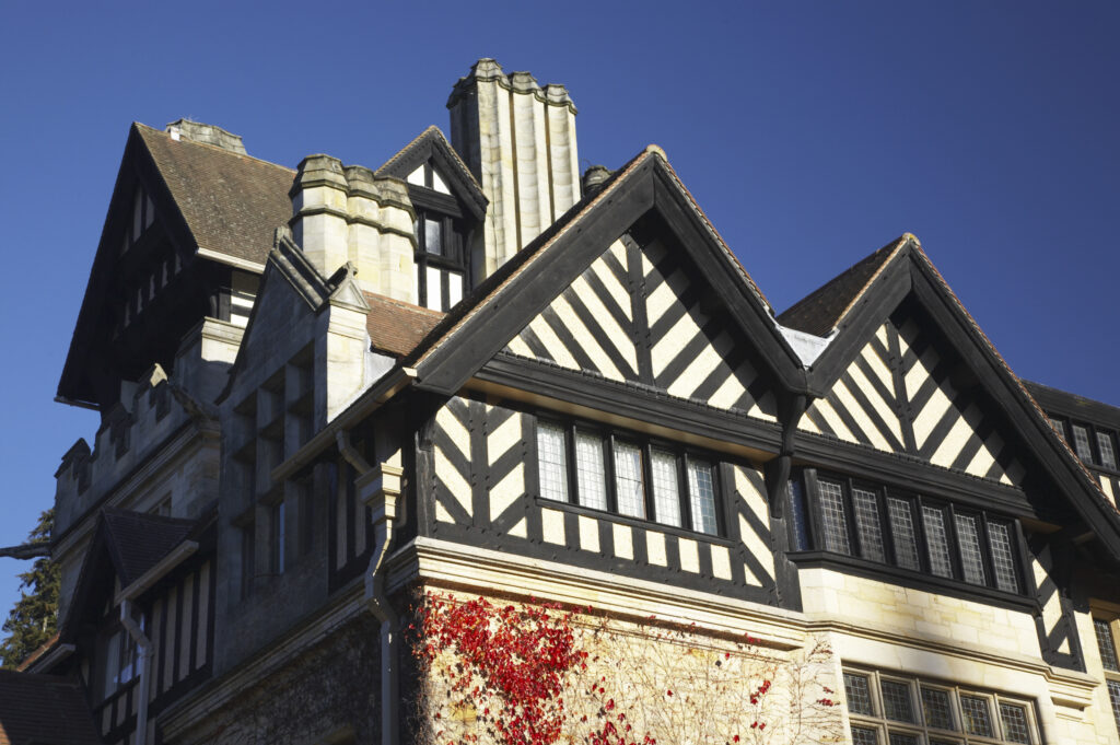 England, Northumberland, Cragside Gardens & Estate. Cragside house located within the gardens of the Cragside estate (National Trust)