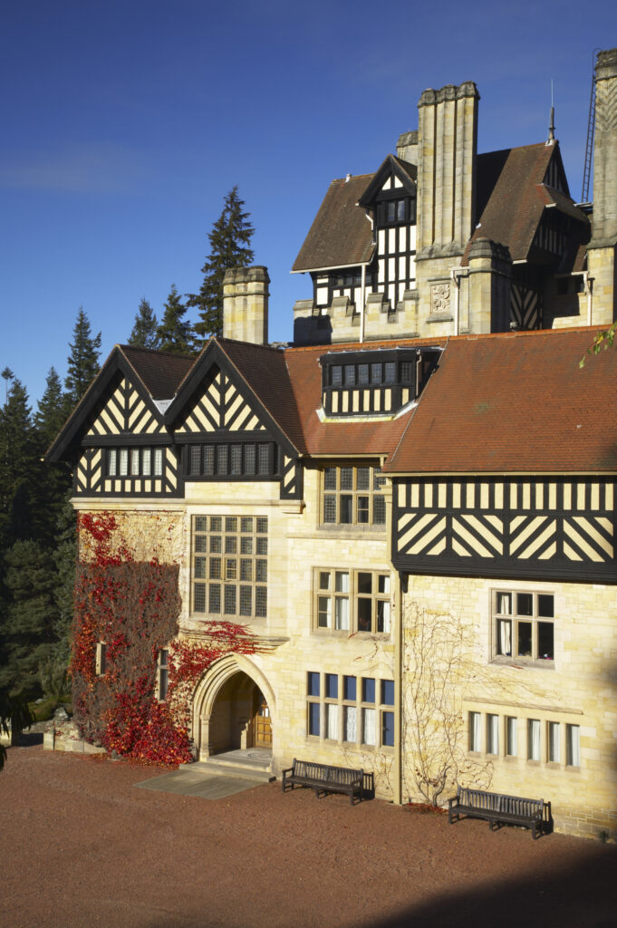 England, Northumberland, Cragside Gardens & Estate. Cragside house located within the gardens of the Cragside estate (National Trust)