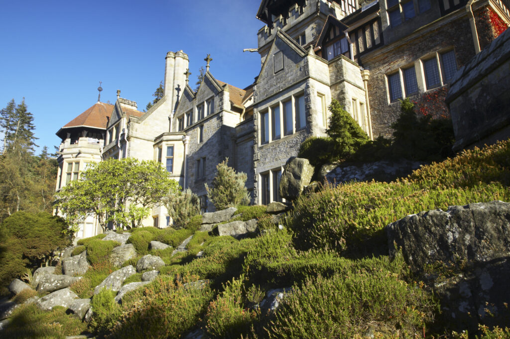 England, Northumberland, Cragside Gardens & Estate. Cragside house located within the gardens of the Cragside estate (National Trust)