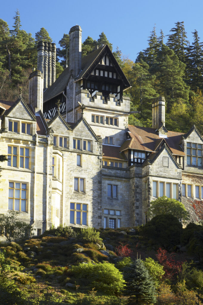 England, Northumberland, Cragside Gardens & Estate. Cragside house located within the gardens of the Cragside estate (National Trust)