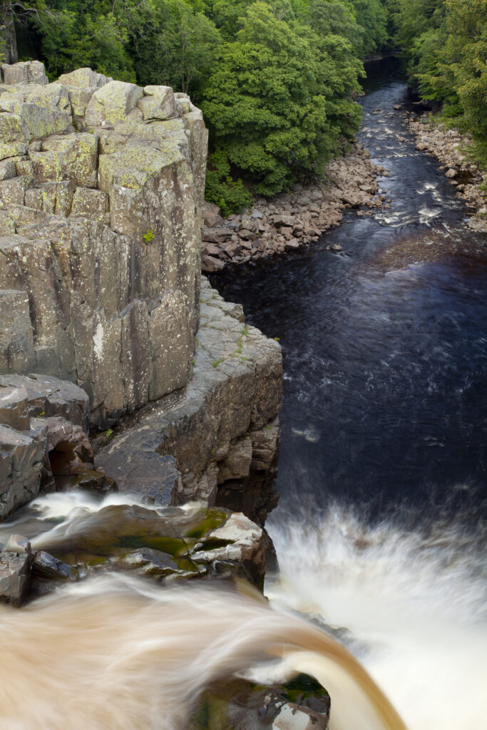 England, County Durham, High Force. The River Tees cascades down the High Force waterfall in County Durham.