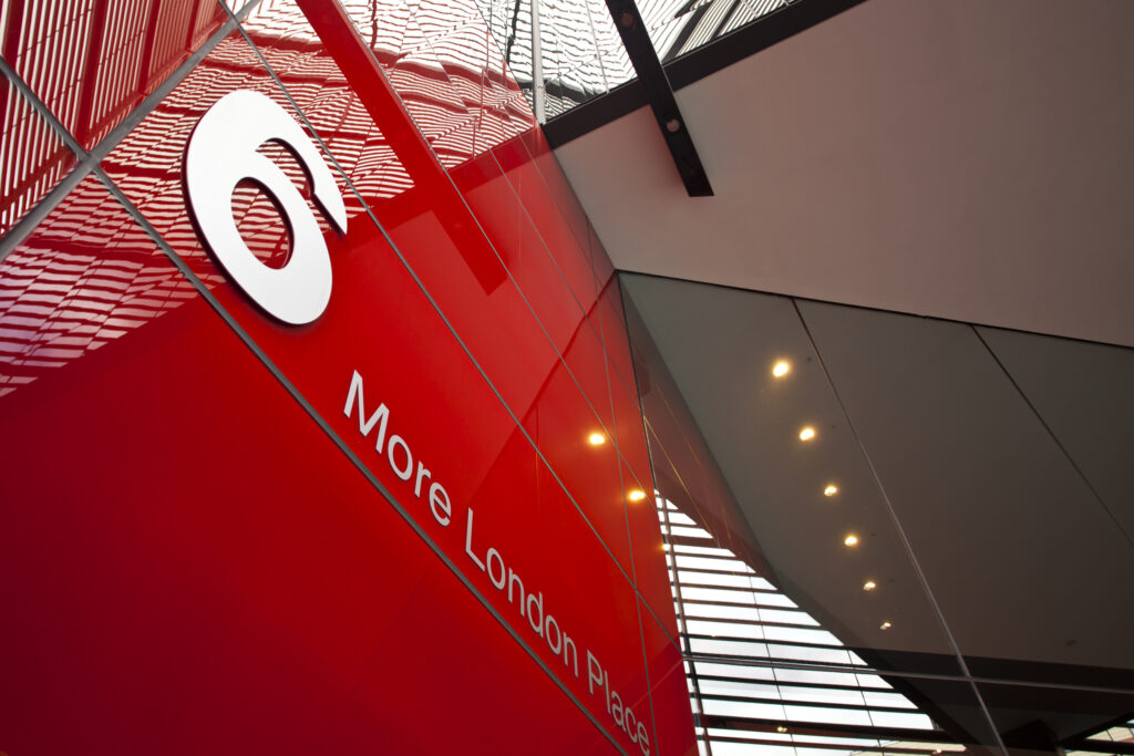 England, Greater London, Southwark. 'More London' caption displayed on the '6 More London Place' office space development near the River Thames.
